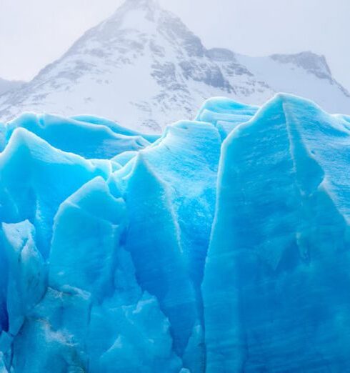 Glacier - Blue Icebergs Under Cloudy Sky