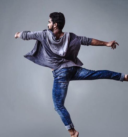 Dance - Man Wearing Blue Jeans Doing Pirouette Spin