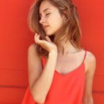 Dress - Woman Wearing Orange Spaghetti-strap Dress