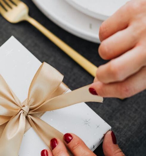 Etiquette - Person Opening a Gift Box