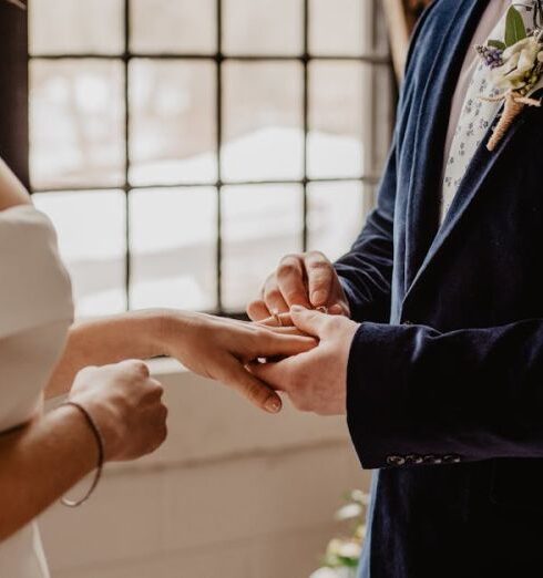 Wedding Ceremony - Woman And Man Holding Each Others Hands