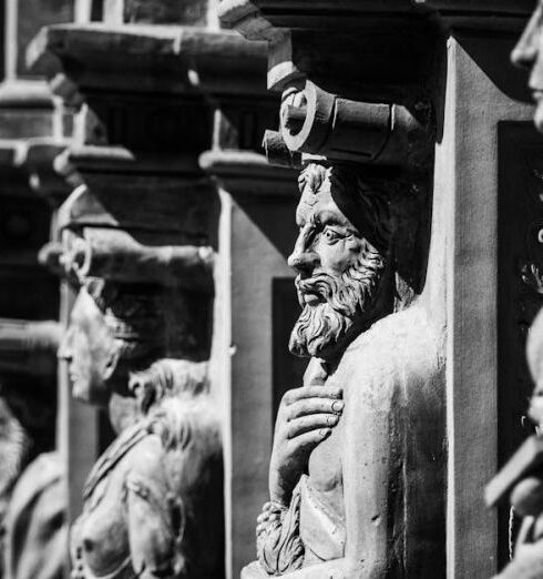 History - Grayscale Photography of Statues