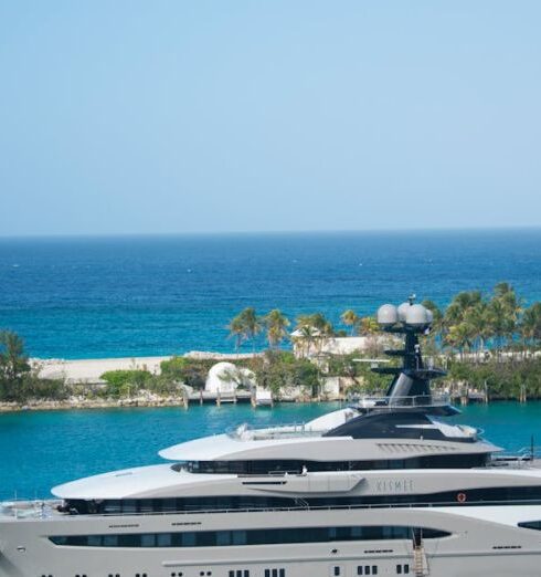 Yacht - White and Blue Yacht on Body of Water