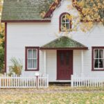 Bungalow - White and Red Wooden House With Fence