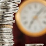 Money - Selective Focus Photo of Stacked Coins