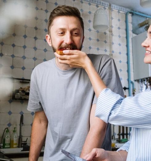 Hostels - Happy Couple Having Breakfast