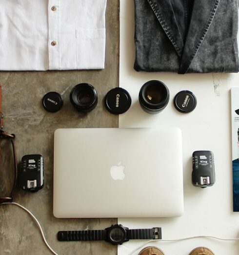 Packing - Brown Leather Bag, Clothes, and Macbook