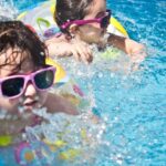 Activities - 2 Girl's Swimming during Daytime