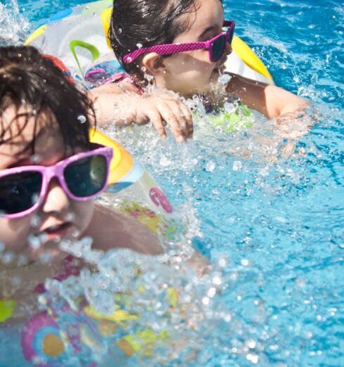 Activities - 2 Girl's Swimming during Daytime