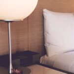 Accommodation - Silver and White Desk Lamp Beside Bed