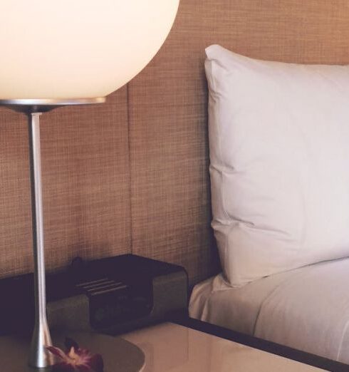 Accommodation - Silver and White Desk Lamp Beside Bed