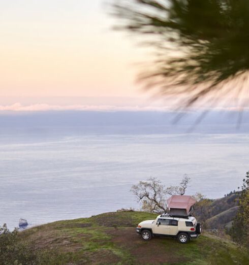 Camping Spots - SUV Parked on the Mountain