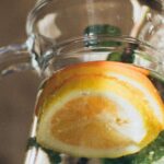 Drink Water - Water With Sliced Lemon in Pitcher