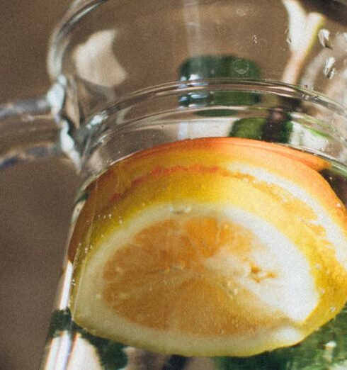 Drink Water - Water With Sliced Lemon in Pitcher