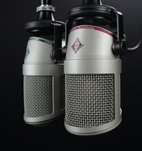 Podcasts - Two Gray Condenser Microphones