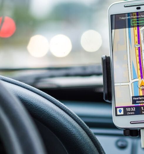 Navigation - White Android Smartphone Inside Vehicle