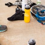 Rest Stops - Helmets and Water Bottles Lying on the Ground 