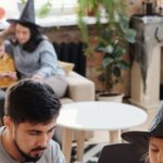 Activities - Father And Daughter Painting Pumpkins Together