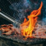 BBQ - Close-Up Photo of Man Cooking Meat