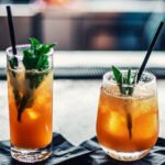 Cocktails - Two Brown Liquid Inside Clear Drinking Glasses