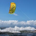 Kite Surfing - Man surfing on the Beach