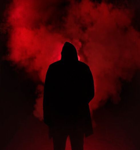 Cool - Silhouette of Man Standing Against Black And Red Background