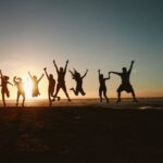 Friends - Silhouette Photography of Group of People Jumping during Golden Time