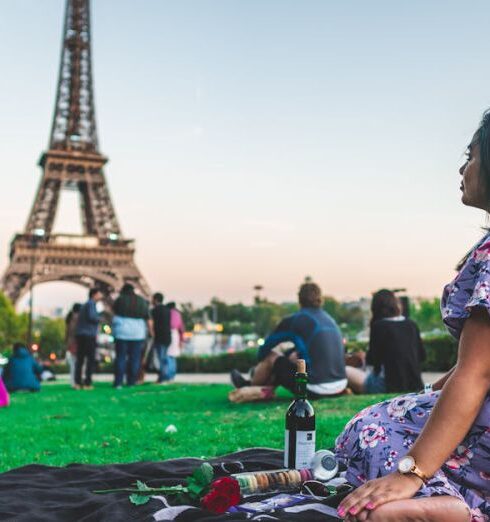 Food Tours - Woman Sitting Near the Eiffel Tower