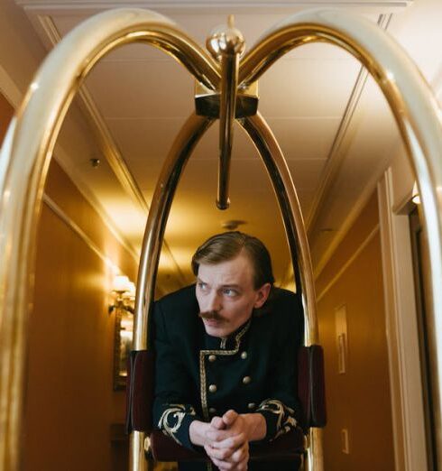 Hotel - Porter leaning on a Trolley