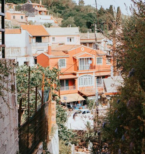 Walkable - Woman Walking on Path Between Buildings