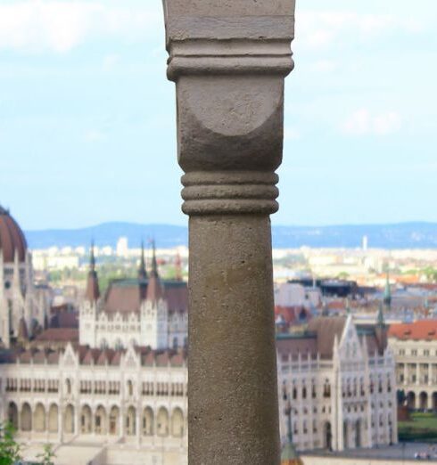 Viewpoints - Orszaghaz behind Wall with Columns behind Danube