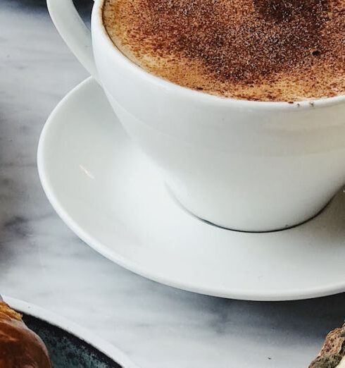 Breakfast - Cup of Coffee Near Croissant Bread