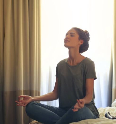 Meditation - Woman Meditating In Bedroom