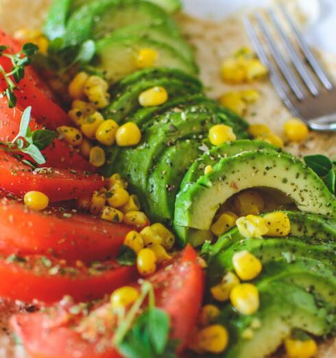 Vegan - Sliced Tomato and Avocado on White Plate