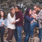 Families - People Standing in Front of Wood Pile