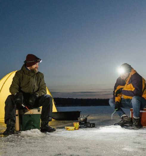 Fishing - Men Fishing in a Frozen Lake