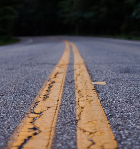 Route - Close Up Photo of Gray Concrete Road