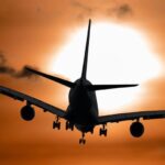 Flights - Shadow Image of a Plane Flying during Sunset