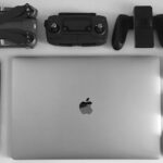 Gadgets - Silver Macbook Surrounding Black Electronic Devices