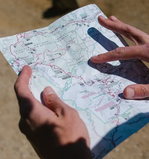 Getting Lost - Person Holding White and Red Heart Print Paper