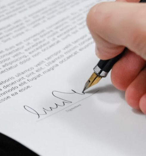 Document - Person Signing in Documentation Paper