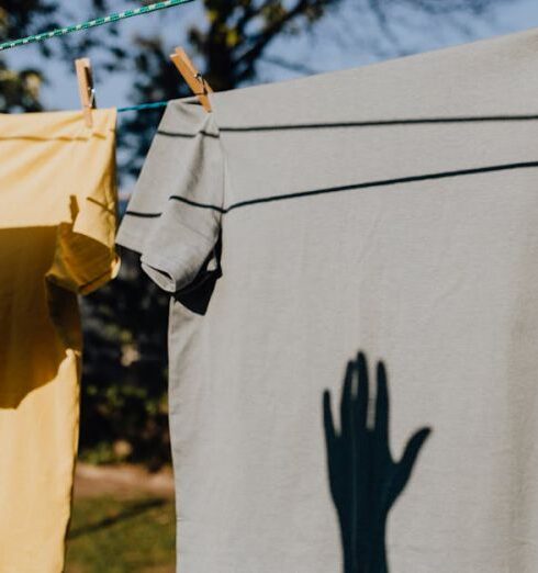 Clothes - Clothes drying on rope with clothespins in garden