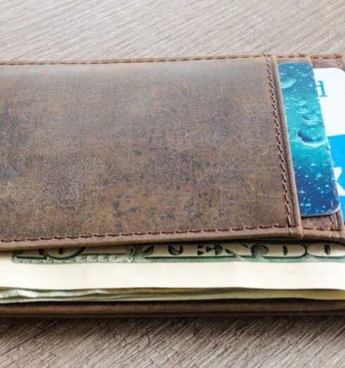 Wallet - Brown Leather Wallet and Us Dollar Banknote