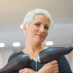 Hairdryers - Woman Wearing Black Long Sleeve Shirt Holding Hairdryers