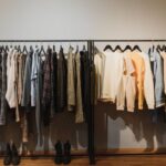 Laundry Solutions - White and Black Clothes Hanging on Black Steel Rack