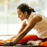 Exercise - Woman Stretching on Ground