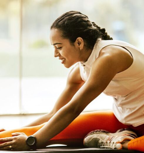 Exercise - Woman Stretching on Ground