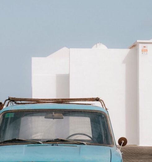 Multi-Destination - Vintage Blue Car by Whitewashed Buildings in Lanzarote