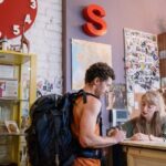 Local Guides - Tourist Standing in front of Reception Desk