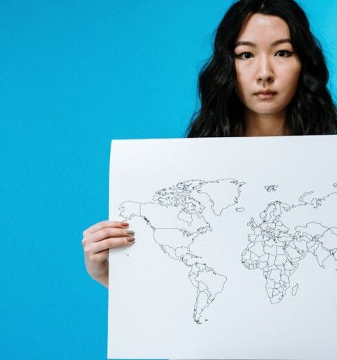 Countries - Woman Holding World Map